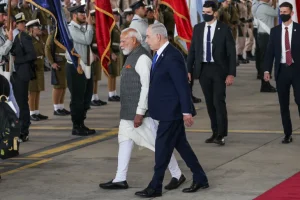 2026-02-25T114054Z_1977362803_RC2ZSJACQOXI_RTRMADP_3_ISRAEL-INDIA-MODI-ARRIVAL-1772020272-300x200 Trump Cuts Tariffs on Indian Goods After Modi Signals Shift Away From Russian Oil
