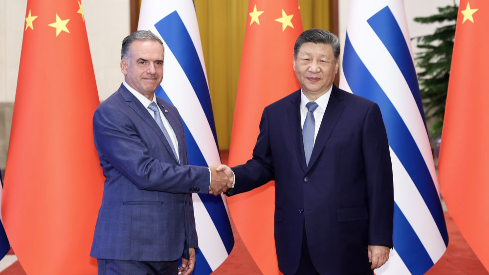 43c41ce30170436b9572e91cd8308e3e China, Uruguay move to upgrade ties as leaders meet in Beijing