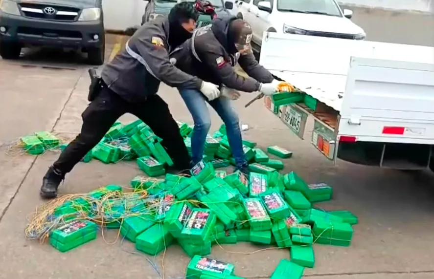Ecuador National Police, Ecuadorian police remove alleged bricks of cocaine from a truck in Carchi, Ecuador. Photo credit: Ecuador National Police
